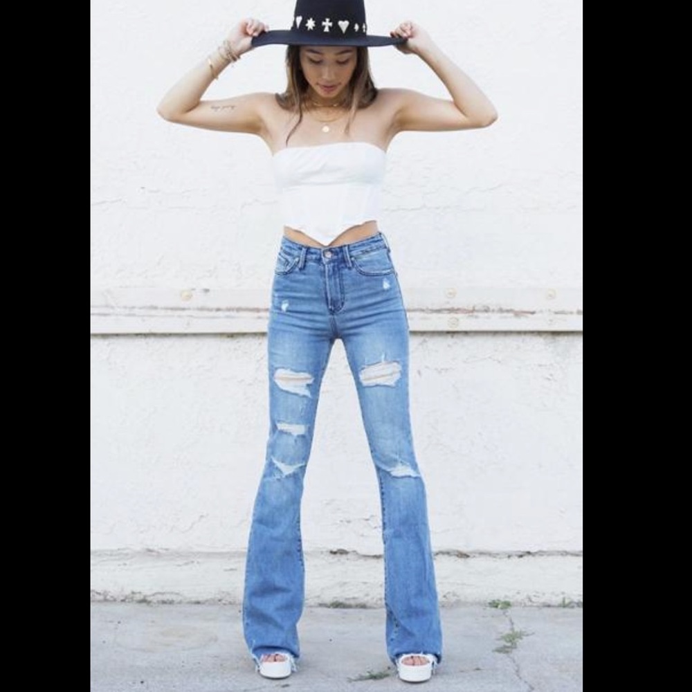 Super high waisted distressed flare jeans
